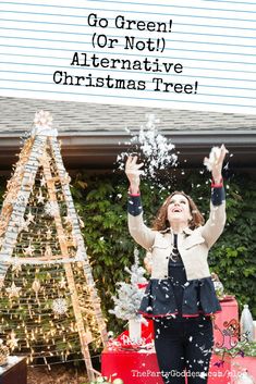 a woman standing in front of a christmas tree with the words go green or not alternative christmas tree