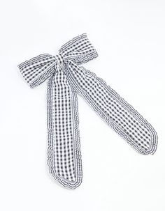 a black and white checkered tie on a white background