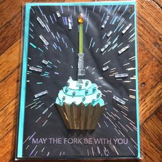 a birthday card with a cupcake on it that says, may the fork be with you