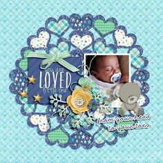 a scrapbook page with a baby's photo and teddy bear in the center