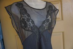 "Vintage 1980s black nightgown by Avon Fashions. Size medium. Condition - has a small part where the seem is pulling from the collar - see last photo. 18\" across front armpit to armpit 16\" across waist 53\" length" Sheer Lace Nightgown For Party, Sheer Lace Party Nightgown, Black Lace Nightgown With Lace Trim, Black Sheer Nightgown, Black Nightgown, Avon Fashion, Maxi Coat, Heavy Knit, Long Maxi