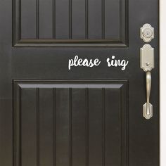 a black door with the words please sing on it and an open door handle that says,'please sing '