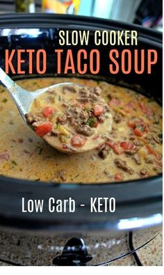 slow cooker keto taco soup in a crock pot with a spoon