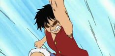 an anime character with black hair and red shirt holding his arm up in the air