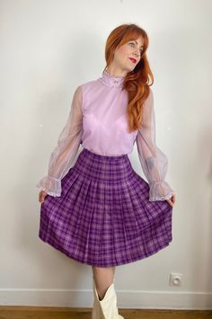 "Vintage 70s/80s pleated plaid midi skirt in various shades of purple. A very lovely piece in a unique color. Perfect to dress up or for casual.  Shown here on a size FR 34-36 / UK 8 / US 0 / XS model 172 cm / 5'8\" height with no adjustments, it fits. This skirt would best fit a FR 34 or small 36/ UK 6-8 /XS depending on your desired fit, but please verify all measurements to be sure. Waist: 32cm - 12.75in Hips: open Overall Length: 63cm - 25in  Condition: Very good - no major flaws to note Mat Purple Plaid Skirt, 70s Plaid, Plaid Midi Skirt, Plaid Pleated Skirt, Purple Skirt, Purple Plaid, Plaid Skirt, Plaid Skirts, Knee Length Skirt