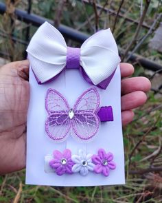 Handmade bow clips in purple and white colour. Made with grosgrain ribbion and butterfly and flowers. For daily wear,  Birthday wear.  Care Instructions : keep it away from water. Birthday Wear, Purple Accessories, Fashion Designing, Butterfly Clips, Handmade Bows, White Colour, Bow Clips, Hair Accessories Headbands, Clip Ins