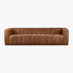 a brown leather couch on a white background