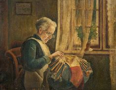 an old woman is sewing in front of a window