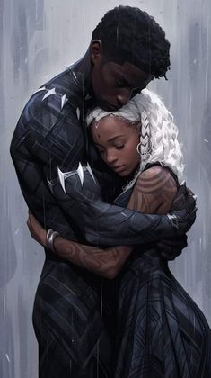 a man and woman hugging in the rain with their arms wrapped around each other's shoulders