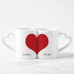 two white mugs with red hearts and the words congratulations written in black on them