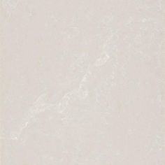 an image of a white wall with some paint splattered on it's surface