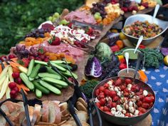 a table filled with lots of different types of food