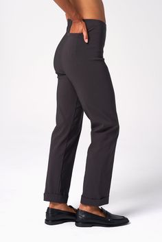 The essential versatile trouser meets our signature Magic fit in this seasonless cuffed style. We love it with a classic buttondown. ✓ High Rise ✓ Two-Way Stretch ✓ All-Day Comfort ✓ Machine Washable DETAILS High-stretch fabrication Elasticated pull-on waistband Center front seam Cuffed hems No-Bulk back pocket FIT Regular fit Slightly tapered True to size Model is 5'8" and wears size S MEASUREMENTS Front rise: 10 1/8" (size S) Leg opening circumference: 14" (size S) Inseam: 28" FABRIC + CARE 75 Cuffed Pants, Black Xs, Denim Pant, Fit In, Back Pocket, Latest Design, Dress Pants, Women's Pants, Fabric Care