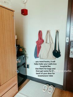 there are two bags hanging on the wall