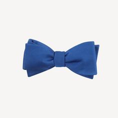 We've partnered with The Tie Bar to bring you this classic assortment of hand tied bowties in a variety of colors. Size is 2.5 in. wide x 58 in. long. Material: Handmade of 100% Silk Fabric Care: Imported, Dry-clean Only Detail: Hand Tied Wedding Bow Tie, Slim Tie, Bow Tie Wedding, Wedding Ties, Tie Bar, Tuxedos, Carolina Blue, Bow Ties, Modern Fit