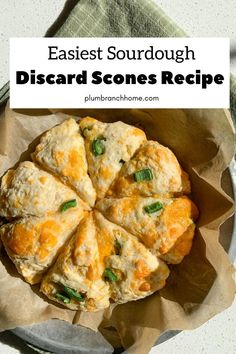 a plate with some biscuits on it and the words, easy sourdough discard scones recipe