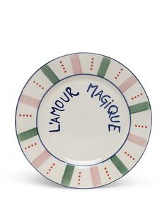 a plate with the words i am your magic written on it, in blue and green stripes