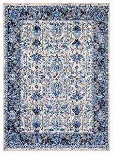 a blue and white rug with an ornate design on the bottom, in front of a white background