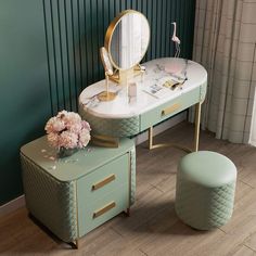 a dressing table with a stool and mirror on it in front of a green wall