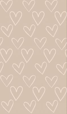 hearts drawn in white on a beige background