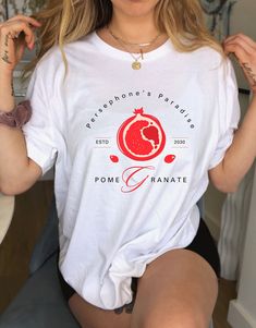 We love our comfortcolors tshirt featuring luscious pomegranates, a symbol of Persephone, The Goddess of Spring! Perfect for someone who wants to show their feminism or feministic spirit while channeling their inner Greed Goddess.  * Q U I C K * F A C T S * ✺ 100% preshrunk cotton ✺ Wash and dry normally (on cool for best results) * S I Z I N G * ✺ Sizing is unisex so runs like men's, though not overly large.  Order up for a loose, trendy oversized fit! ✺ Most women find their typical size works best, since they are meant to fit a touch loose ✺ Check out our photo for size guide and fit:   *S H I P P I N G * T I M E S * ✺ Our items are individually made with love for each of our buyers. Because of this, our processing time is 2-5 business days (depending on order volume) plus transit time, Shirts Preppy, Selling T Shirts, Persephone Pomegranate, Pomegranate Print, Oddly Specific, Preppy Stuff, Clean Girl Aesthetic, Clean Girl, Greek Mythology