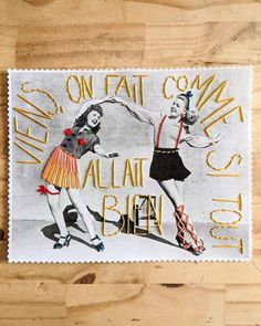 a stamp with two women dancing on it