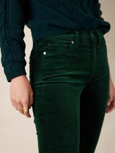 An inspired silhouette that never goes out of style, this slim velvet jean is made from a plush cotton blend to conjure the cozy, holiday spirit all season and beyond.  SLIM FIT: Our version of the cigarette jean.  Fitted from hip to knee, with a sli Trendy Velvet Pants For Fall, Green Velvet Pants Outfits, Velvet Jeans Outfit, Emerald Pants, Velvet Pants Outfit, Green Velvet Pants, Allman Brothers, Velvet Jeans, Cozy Holiday