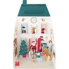 an open christmas gift box with paper cutouts and decorations on the inside, including santa's sleigh