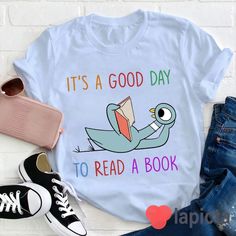 a t - shirt that says it's a good day to read a book