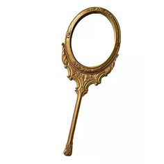 an antique looking magnifying glass on a white background