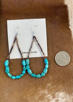 Beautiful Heshie Native American-made teardrop drop hook earrings with turquoise. The ideal jewelry item to give as a present or to keep for yourself! These are light and straightforward while still being elegant. The perfect turquoise teardrop earrings for anyone's jewelry collection!  Size: 3” inch length   Stone: Turquoise Native American Bead Jewelry, Western Style Earrings, Turquoise Dangle Jewelry With French Hook, Adjustable Turquoise Teardrop Jewelry, Southwestern Adjustable Teardrop Earrings, Adjustable Teardrop Jewelry With French Hook, Adjustable Southwestern Teardrop Earrings, Adjustable Turquoise Teardrop Earrings, Adjustable Southwestern Style Teardrop Earrings