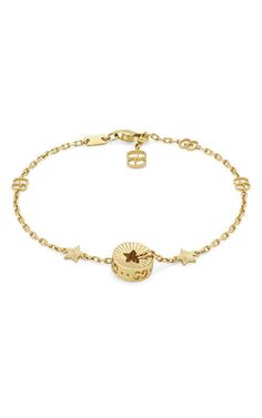 GUCCI Icon 18kt Star Bracelet Yellow Gold YBA729370001.This precious bracelet is presented in 18k yellow gold with a delicate chain featuring the GG motif. The piece's focal point is a circular charm featuring a cut-out star, that recalls the Gucci Cosmogonie fashion show. Taking place beneat... Gucci Cosmogonie, Diamond Accessories, Cushion Diamond, Gold Diamond Necklace, Star Bracelet, Square Diamond, Delicate Chain, Princess Diamond, Oval Cut Diamond