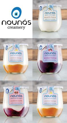 four different types of yogurt are shown in the image, including blueberries and raspberry