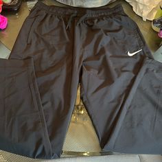 Nike Dri Fit Pants - Pockets , Zipper Bottoms, Back Zipper With Inside Pocket. Size Xl. Brand New No Tags Pants Nike, Fit Pants, Pants Color, Nike Pants, Pocket Size, Men's Nike, Nike Dri Fit, Workout Pants, Black Nikes