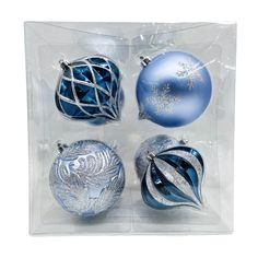 four blue glass ornaments in a clear box