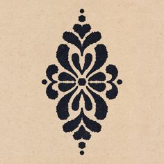 a black and white pattern on a piece of paper that looks like an ornament