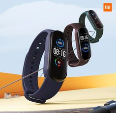 three different smart watches on display in front of a blue sky and yellow background with the words mio