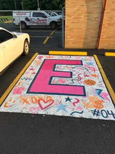 the parking lot has been decorated with graffiti