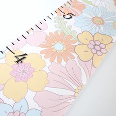 a calendar with flowers on the cover