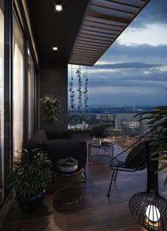 the balcony is lit up with lights and plants