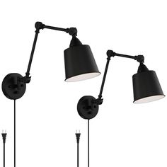 two black wall lights with one light on each side and the other off to the side