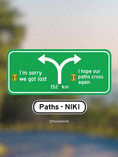 there is a green street sign with two arrows pointing in opposite directions and the words paths - niki on it