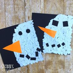 two snowmen made out of broken pieces of paper