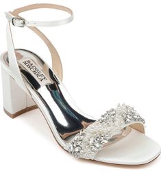 a women's white high heeled sandal with crystal embellishment