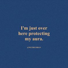 a blue background with the words, i'm just over here protecting my aura