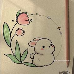 a drawing of a little bunny with flowers on it