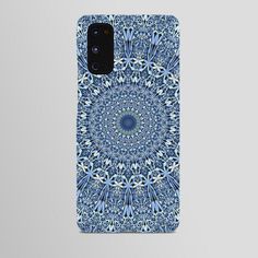 a blue and white phone case with an intricate design on the front, featuring a circular pattern