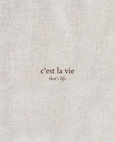 the words in french are written on white linens with red lettering that reads, cest la vie