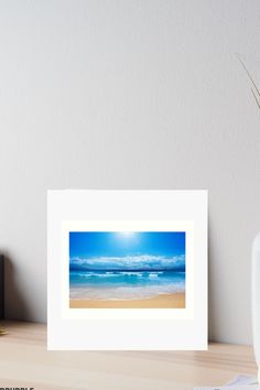 an ocean scene with the sun shining down on the beach art print by design express