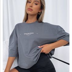 White Fox Boutique Oversized T-Shirt Oversized Gray Tops For Summer, Oversized Gray Summer Top, Basic Oversized Gray T-shirt, Oversized Gray Basic T-shirt, Oversized Gray T-shirt With Text Print, Gray Spring Streetwear Tops, Gray Drop Shoulder Top For Streetwear, Gray Oversized Short Sleeve Top, Gray Boxy Fit Top For Streetwear